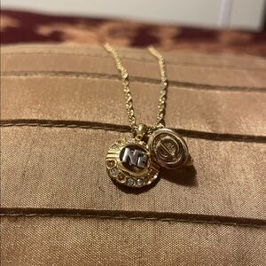 Nina Ricci necklace/Christian Dior clip earring